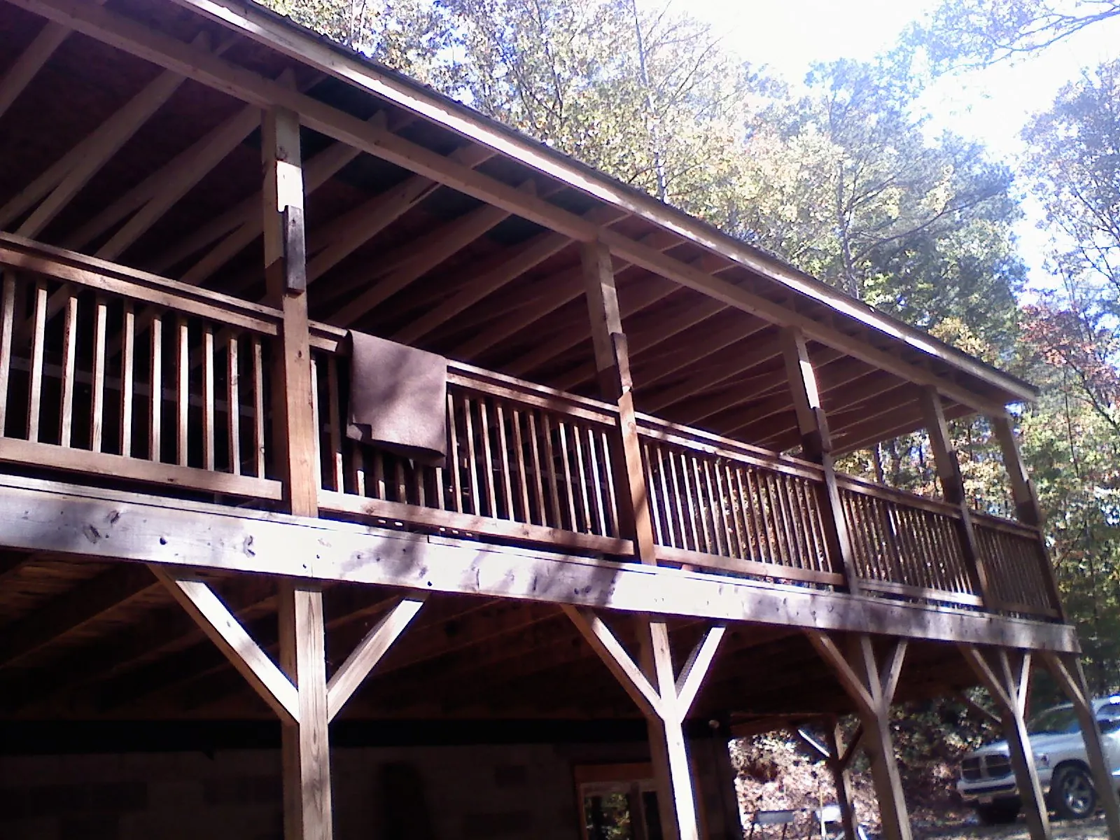 Timber framing under a new elevated porch and deck — Roof Leak Repair in Casper by Roofing Brothers